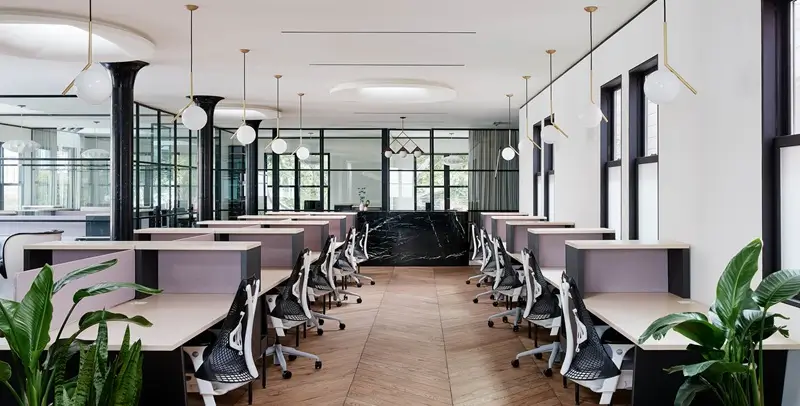 Global Collective San Francisco | Canopy Premium Coworking Virtual office rental San Francisco - Canopy premium coworking with pink accents, open office space and glass partitions in modern design